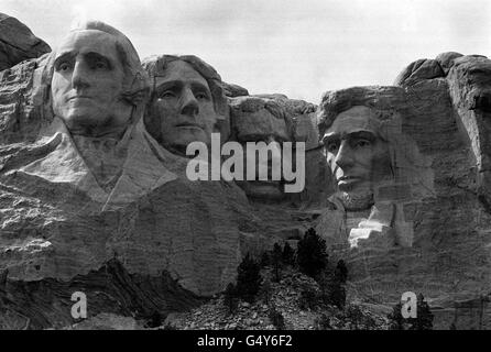 Mount Rushmore, America's Shrine of Democracy 'written' in mountain sculpture in the Black Hills of South Dakota. The rock heads of four former Presidents - Washington, Jefferson, Roosevelt, and Lincoln are a national monument of American history. * They are an outstanding testimony of the work of sculptor Gutzon Borglum who started the collosal project in 1927. Each head is 60ft high and scaled to men 465 ft tall if fully carved. Each nose is 20ft long, the eyes 11ft wide and Lincoln's mole is 15 inches across.