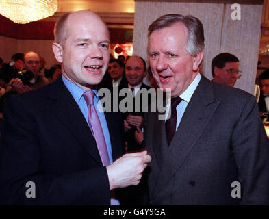 Conservative Party leader William Hague (L) with Tory London Mayoral candidate Steve Norris, at a Chinese New Year reception at the Cheung Ku Chinese Restaurant in London's chinatown. Stock Photo