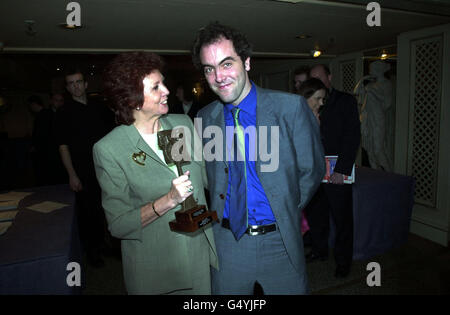 Actor James Nesbitt with Blind Date presenter Cilla Black after she received a special award for outstanding contribution to broadcasting, at the Television and Radio Industries Club (Tric) Awards in London. Stock Photo