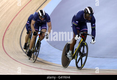 Gregory Bauge leads the French team of Mickael D'Almeida and Kevin Sireau during the Men's Team Sprint Qualifying during day one the UCI Track Cycling World Cup at the Velodrome in the Olympic Park, London. Stock Photo