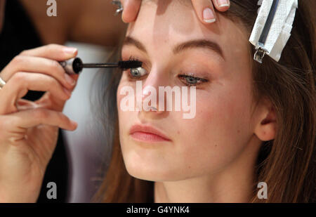 Models backstage during the Topshop Unique show as part of London Fashion Week, Topshop Venue, Old Billingsgate, London. Stock Photo