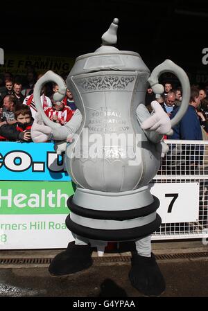 Soccer - FA Cup - Fifth Round - Crawley Town v Stoke City - Broadfield Stadium. FA Cup Trophy mascot Stock Photo