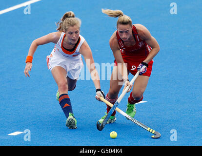 Netherland's Xan de Waard and Great Britain's Susannah Townsend during the pool match between Netherlands and Great Britain on day two of the FIH Women's Champions Trophy at the Queen Elizabeth Olympic Park, London. Stock Photo