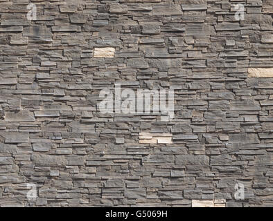 Pattern wall from grey decorative stones Stock Photo