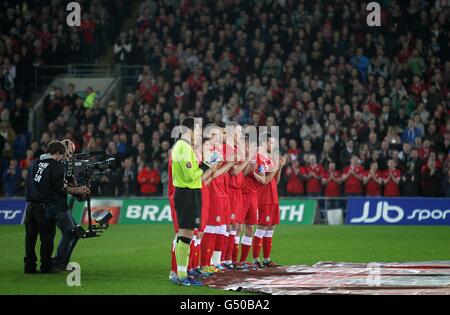 Cardiff, UK. 06th Nov, 2021. Cardiff City Players observe a minute