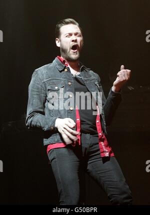 NME Awards 2012 - Show - London. Tom Meighan of Kasabian performs on stage during the 2012 NME Awards at the O2 Academy Brixton, London. Stock Photo