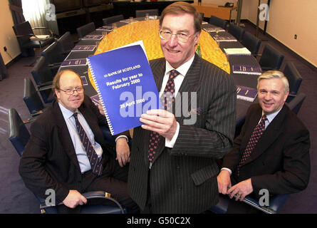 From left to right: Bank of Scotland's Gordon McQueen, divisional chief executive for treasury; Peter Burt, group chief executive; George Mitchell, divisional chief executive in corporate banking, at their City head office, London. * The group's underlying earnings hit record levels despite Bank of Scotland's failed bid to take over NatWest knocking 54 million off its profits for the last year. Stock Photo
