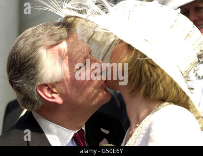 Tory London mayor candidate Steve Norris kisses bride Emma Courtney, during their low-key wedding ceremony at Chelsea register office in west London. Stock Photo