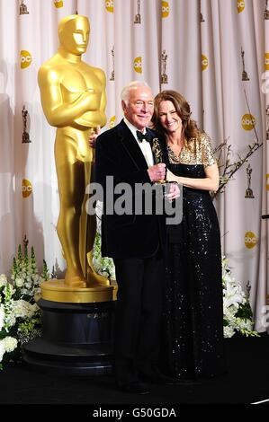 Christopher Plummer with the Performance by an Actor in a Supporting Role award, received for Beginners, and Melissa Leo at the 84th Academy Awards at the Kodak Theatre, Los Angeles. Stock Photo