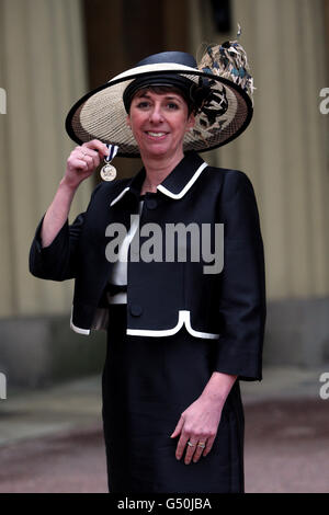 Metropolitan Police Detective Chief Inspector Caroline Goode after she received the Queen's Police Medal following an Investiture ceremony hosted by the Prince of Wales at Buckingham Palace, London. Stock Photo