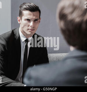 Two Business men talking at office Stock Photo