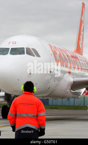 An easyJet passenger plane taxis to the new terminal building at London Southend Airport in Essex. Stock Photo