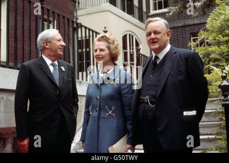 The new British Prime Minister Edward Heath, left, with Margaret Thatcher, Secretary for Education and Science, and Quentin Hogg, the Lord Chancellor, in the garden of No 10 Downing Street, London. Stock Photo