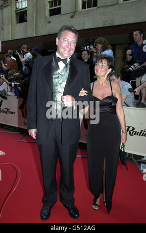 Landscape gardener Tommy Walsh and wife Marie who presents television's Ground Force, arrives at the British Academy TV Awards (BAFTA's) in London. Stock Photo