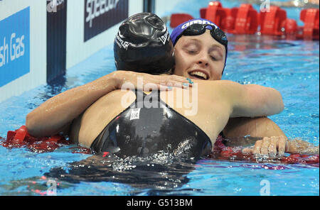 Fran Halsall celebrates with Amy Smith after winning gold in the Women's 100m Freestyle during the British Gas Swimming Championships at the Aquatics Centre in the Olympic Park, London. Stock Photo