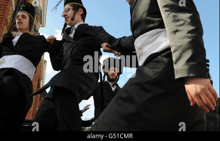 Orthodox Jews in Stamford Hill, north London, celebrate Purim. A Jewish holiday that commemorates the deliverance of the Jewish people in the ancient Persian Empire from destruction in the wake of a plot by Haman, a story recorded in the Biblical Book of Esther. Stock Photo