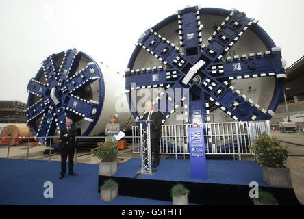 The Mayor of London Boris Johnson (right) and Transport Secretary Justine Greening (centre), during the official unveiling of the first two from a total of eight, Crossrail tunnelling machines, at the Crossrail Westbourne Park construction site in west London. Stock Photo