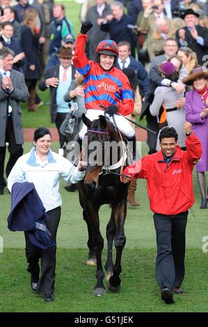 Sprinter Sacre ridden by jockey Barry Geraghty enters the winners enclosure after winning the Racing Post Arkle Challenge Trophy Chase on Centenary Day, during the Cheltenham Festival. Stock Photo