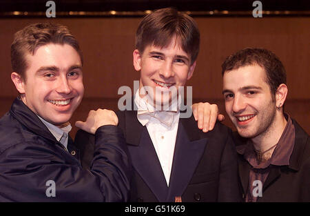 18 year old Guy Johnston (centre), the BBC Young Musician of the Year 2000, with the two previous winners Rafal Zambrzycki-Payne (L) and Adrian Spillett, at the Bridgewater Hall in Manchester. Stock Photo