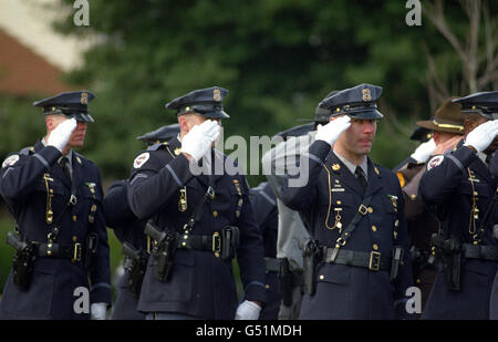 police salute at funeral for  officer killed in the line of duty Beltsville, Maryland 2000 Stock Photo