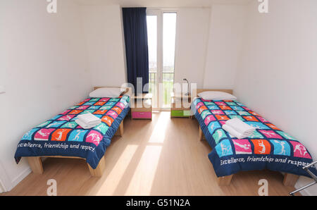 General view of an apartment bedroom, in the Athlete's Village, at the Olympic Park, in Stratford, east London. Stock Photo