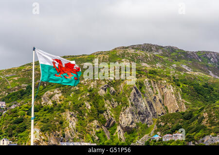 Welsh flag flying over Barmouth Wales UK Stock Photo