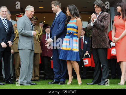 The Prince of Wales (second left) officially opens the Ideal Home Show with (left to right) George Clarke, Myleene Klass, Laurence Llewelyn-Bowen and Suzi Perry, at Earl's Court, London. Stock Photo