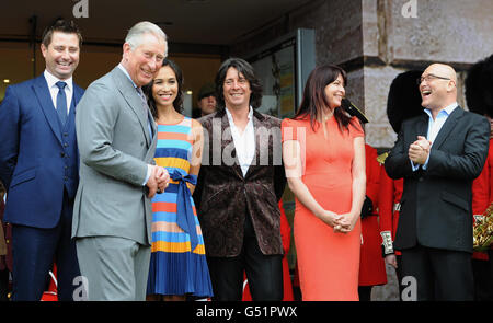 The Prince of Wales (second left) officially opens the Ideal Home Show with (left to right) George Clarke, Myleene Klass, Laurence Llewelyn-Bowen, Suzi Perry and Gregg Wallace, at Earl's Court, London. Stock Photo