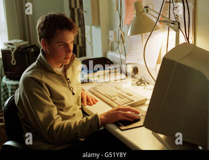 Prince William in front of a computer. IT is taught in the boy's first year at the school, which plans to have a computer point in every boy's room. Gailey's House has four compuers for boys to use but around half the boys have their own laptop computer in their rooms. Prince William does not. All computers are connected to the School's Intranet. Boys' access to the internet is limited as are the sites they visit. Photograph: Ian Jones. Copyright: St James's Palace. * 17/8/2000: The Prince passed three A-levels with flying colours. The Prince gained an A in Geography, a B in History of Art Stock Photo