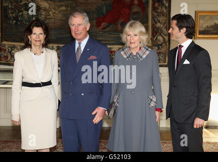(left - right) Queen Silvia of Sweden, The Prince of Wales, The Duchess of Cornwall and Prince Carl Philip of Sweden pose for an official photo in the Royal Palace in Stockholm, Sweden.
