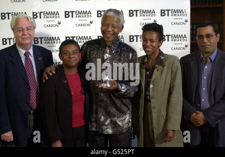 Former South African president, Nelson Mandela (c) with the 'Ethnic Multi cultural Media Awards' (EMMA) Lifetime Achievement Award' at The South Africa High Commission, London. With him are Doreen Lawrence (l), Cheryl Carolus (r) and Donald Woods (far left). * Mr Mandela is stood with Doreen Lawrence, (l) and the South African High Commissioner, Cheryl Carolus. * June 29, 2000 of South African journalist Donald Woods (left) with former South African president, Nelson Mandela (right) and Doreen Lawrence at The South Africa High Commission, London. Mr Woods, an anti-apartheid activist died at Stock Photo