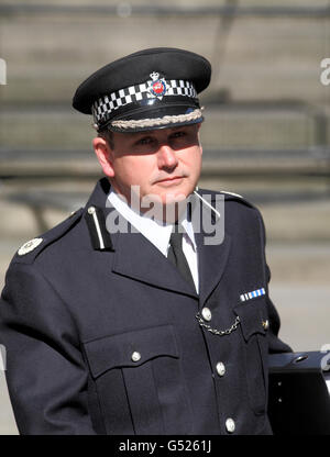 Surrey Police Assistant Chief Constable Jerry Kirkby leaves the Royal Courts of Justice, London, after giving evidence to the Leveson Inquiry. Stock Photo