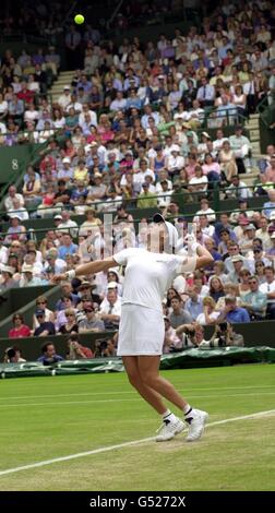 NO COMMERCIAL USE: America's Monica Seles prepares to serve during her match against Spain's Arantxa Sanchez-Vicario at the Lawn Tennis Championships 2000 at Wimbledon in London. Stock Photo