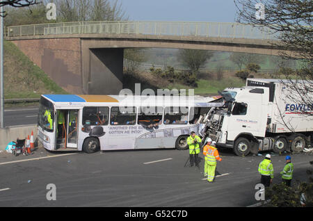Emergency workers at the scene of a crash near Frankley Services on the M5 in the West Midlands, involving a coach and a lorry in which one person was killed.