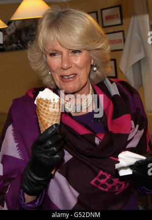 The Duchess of Cornwall enjoys an ice cream from Brostraede Flode-IS, the oldest ice cream shop in Denmark during a tour of the old town in Elsinore, Denmark. Stock Photo