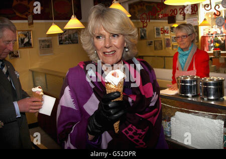 The Duchess of Cornwall enjoys an ice cream from Brostraede Flode-IS, the oldest ice cream shop in Denmark during a tour of the old town in Elsinore, Denmark. Stock Photo