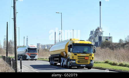 Petrol Tankers leave Stanlow Oil refinery, Ellesmere port, Cheshire. Stock Photo