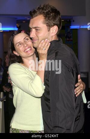 Actor Jude Law and his actress wife Sadie Frost at the Gala premiere of the film Essex Boys, held at the Odeon cinema in Southend, Essex. * 14/8/03: Frost has begun to divorce her Oscar-nominated husband Jude Law, she announced. The couple split at the start of this year after more than five years of marriage, and divorce had been widely anticipated. A statement released on her behalf tonight cited Law s 'unreasonable behaviour'. Stock Photo