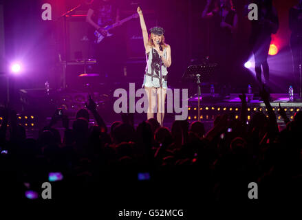 Kylie Minogue in Concert - London. Kylie Minogue performs on stage at the Hammersmith Apollo in west London during her UK tour. Stock Photo