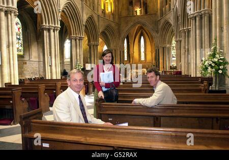 Objectors to the removal the Pershore Abbey's pews (L-R) John Alexander, Susan Kottler and Charles Hudson during a break in court proceedings at the abbey in Worcestershire. * The Church of England Consistory Court is aiming to settle a dispute over whether the historic abbey should provide worshippers with pews, chairs or a mixture of both. Stock Photo