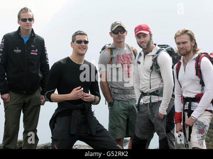 Members of the Walking with the Wounded team (from the left) Captain Francis Atkinson, Captain David Wiseman, Private Jaco van Gass, Captain Martin Hewitt and Private Karl Hinett trek near Khumjung, Napal, on their way to Everest before trying to reach the summit. Stock Photo