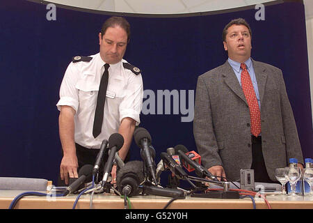 Assistant Chief Constable Nigel Yeo (l) stood alongside Chief Inspector Mike Alderson, police spokesman controls his emotions during a press conference, as he announced the body of a young girl discovered beside the A29 north of Pulborough was Sarah Payne. * Sarah disappeared while playing in a corn field near her grand parent's Worthing home in Sussex. Mr Yeo stood and asked for a minutes' silence to be observed at the conference. Pictured right is Chief Inspector Mike Alderson, police spokesman. Stock Photo