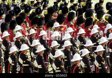 Massed bands from the Royal Marines, the Guards and RAF march past during the pageant on London's Horse Guards Parade to mark the 100th birthday of the Queen Mother on 4/8/00. Some 1,000 people, animals and aircraft are taking part reflecting all parts of Britain's national life. Stock Photo