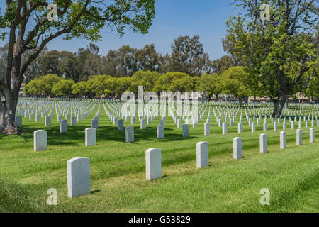 Lines of white grave stones mark resting place of American soldiers. Stock Photo