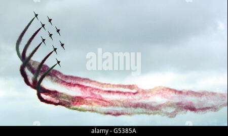 The Red Arrows display team on the opening day of the Farnborough Airshow. Around 300,000 people are expected at the biennial show which is being held in July for the first time having been moved from its normal early September slot. Stock Photo