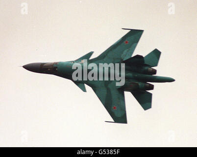 A Russian Sukhoi SU32 during it's display on the opening day of the Farnborough Airshow. Around 300,000 people are expected at the biennial show which is being held in July for the first time having been moved from its normal early September slot. Stock Photo