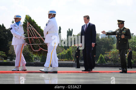 Prime Minister David Cameron lays a wreath at the Kalibata National Heroes Cemetery in Jakarta today on his arrival in Indonesia for a two day visit. Stock Photo