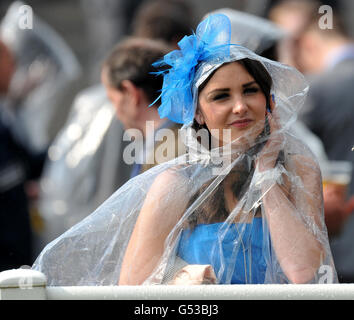 Horse Racing - The 2012 John Smith's Grand National - Day Two - Aintree Racecourse. Wet weather hits Ladies' Day at Aintree Racecourse Stock Photo