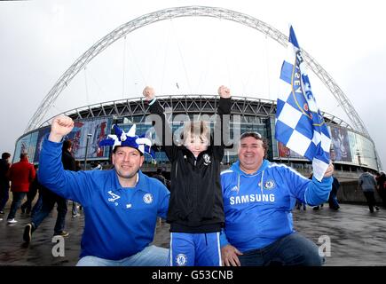 Soccer - FA Cup - Semi Final - Tottenham Hotspur v Chelsea - Wembley Stadium. Chelsea fans (left to right) Dave Scott, Cole Chapman and Steve Chapman on Wembley Way before the match Stock Photo