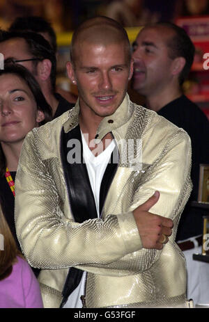 Footballer David Beckham at a signing for his wife Victoria's (Posh Spice in girl band the Spice Girls) new record Out Of Your Mind, a collaboration between Victoria, Dane Bowers and True Steppers, at Virgin Megastore, Piccadilly. * Stock Photo